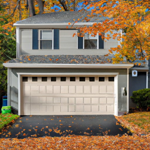 Suburban Natick garage door closed with autumn leaves and visible weatherstripping